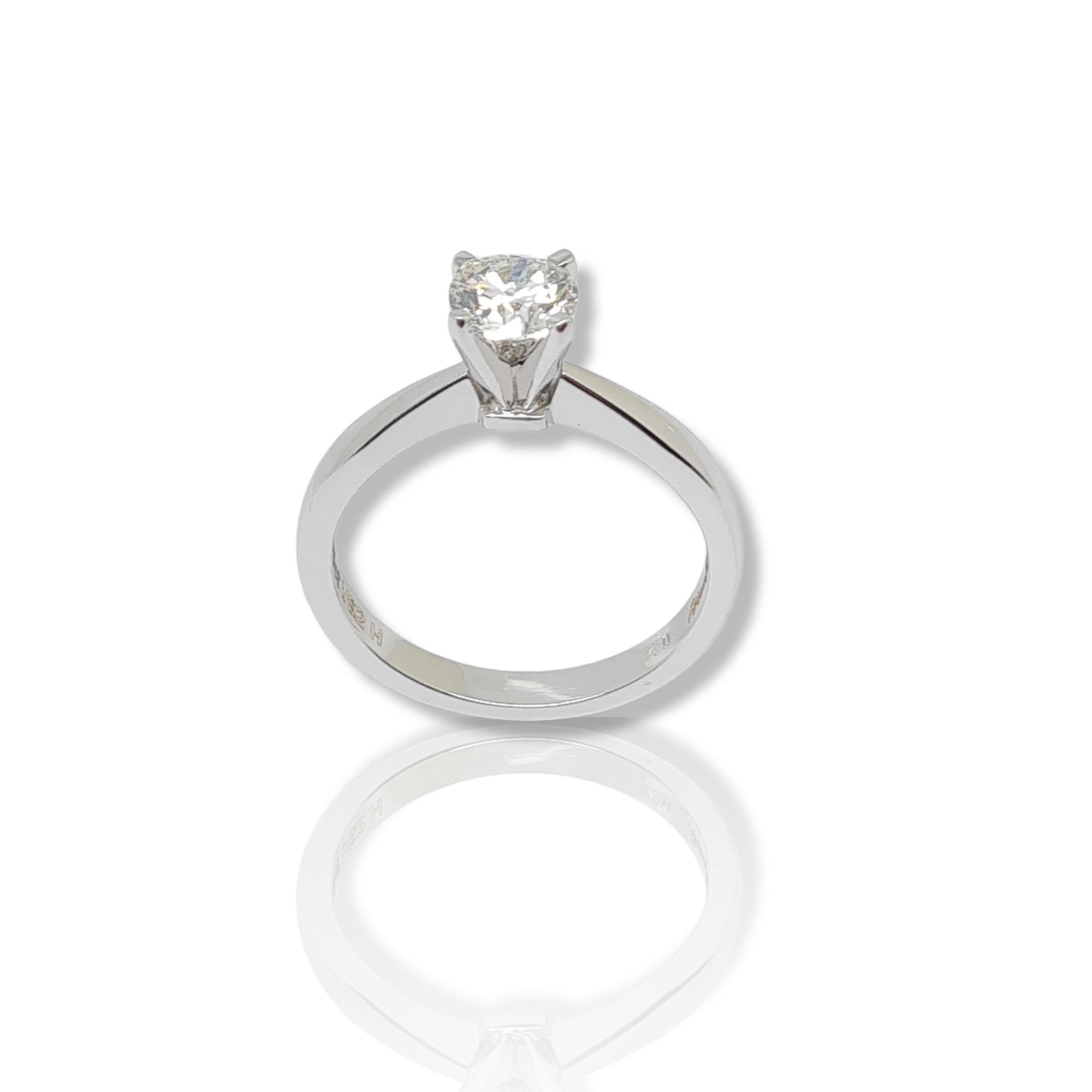 White gold single stone ring k18 with diamond fitted on elevated bezel with four teeth (code T1917)